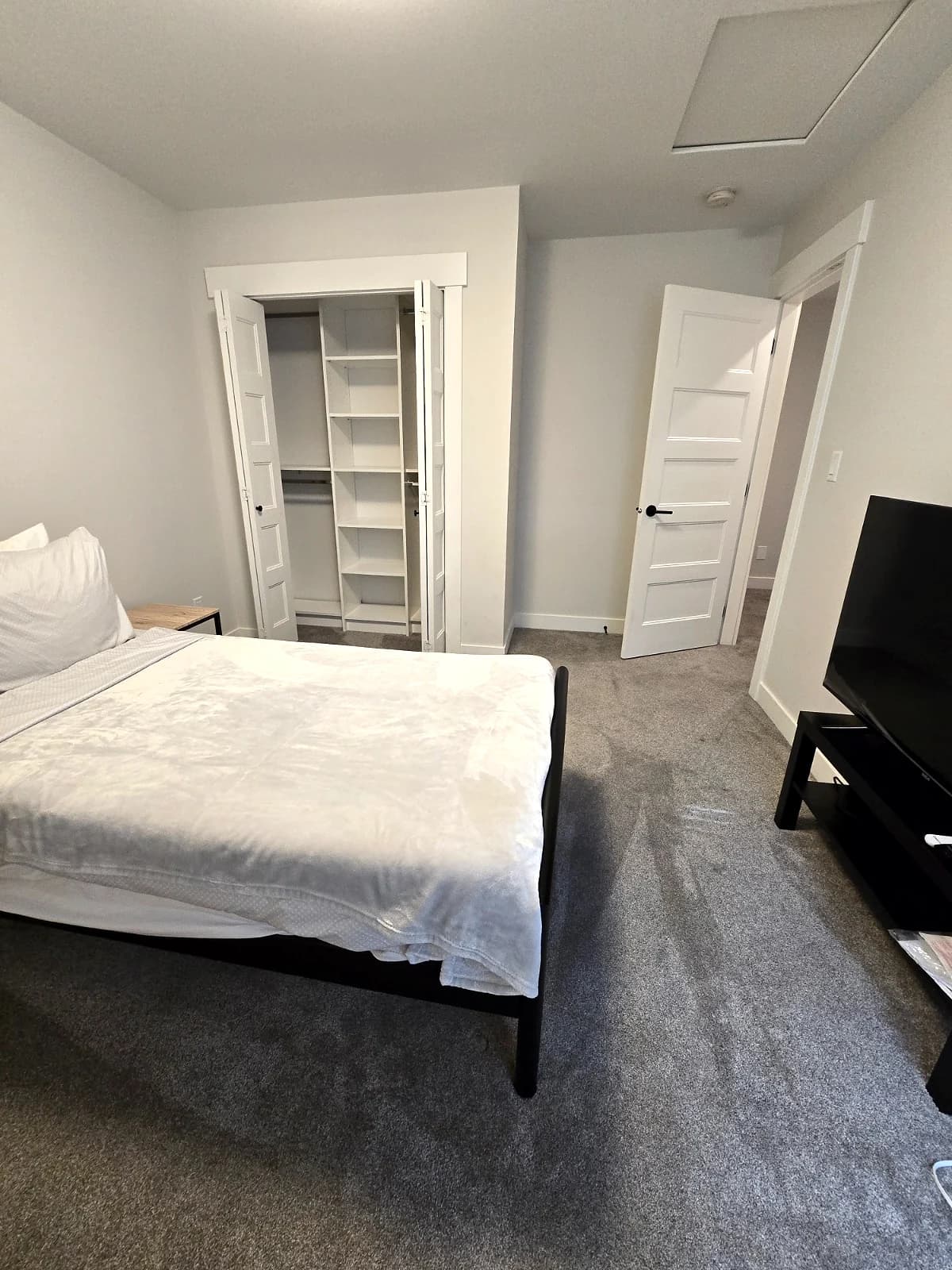 Furnished bedroom at the Maitland townhouse